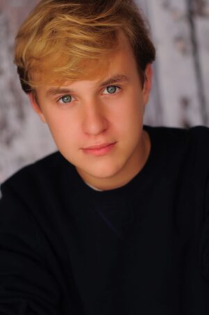 Carter Updated headshot 1